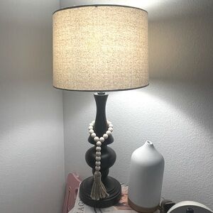 Black lamp with cream shade